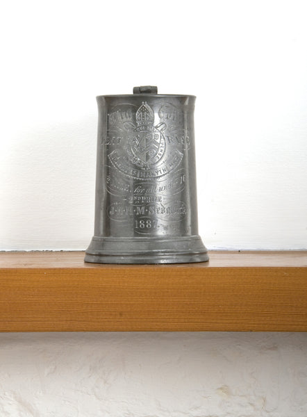 A pewter tankard awarded for the half mile under 16 flat race, 1887