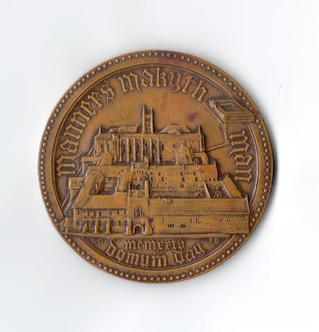 A bronze medal produced on the retirement of Montague Rendall as Headmaster by Frank Bowcher, 1924