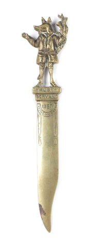 A brass Trusty Servant letter opener, circa 1910