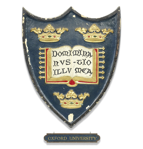 A large painted plaster and wood arms of Oxford University, early 20th Century